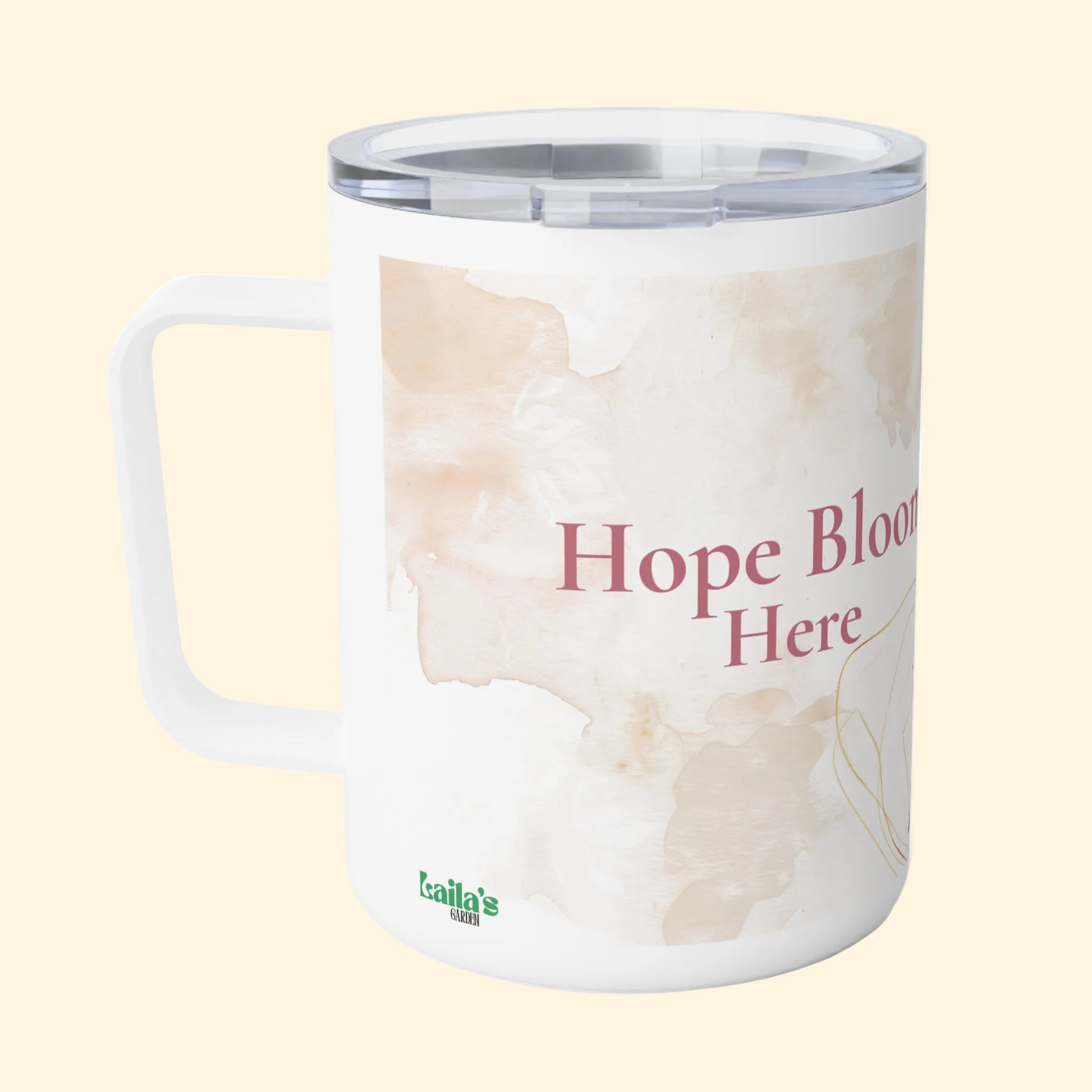 Mug with 'Hope Blooms Here' text and floral design on a white background