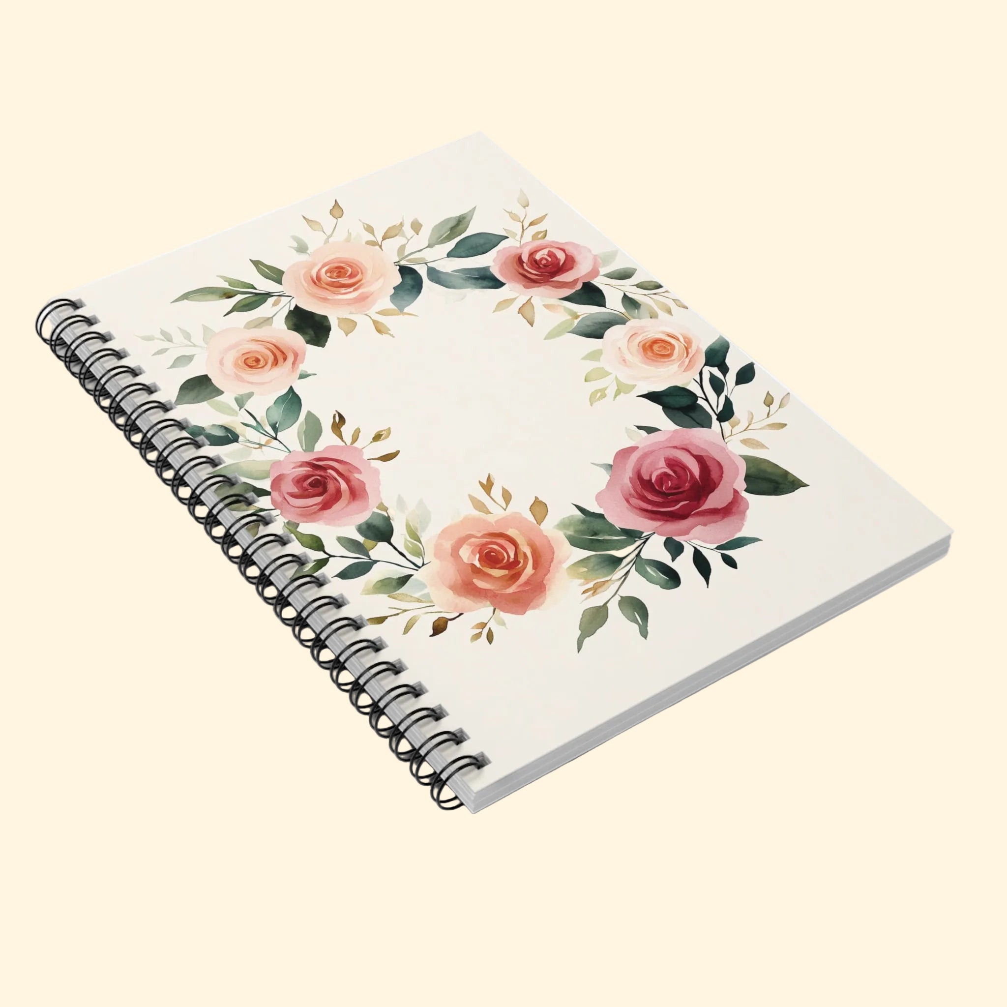 Notebook with floral design on a white background