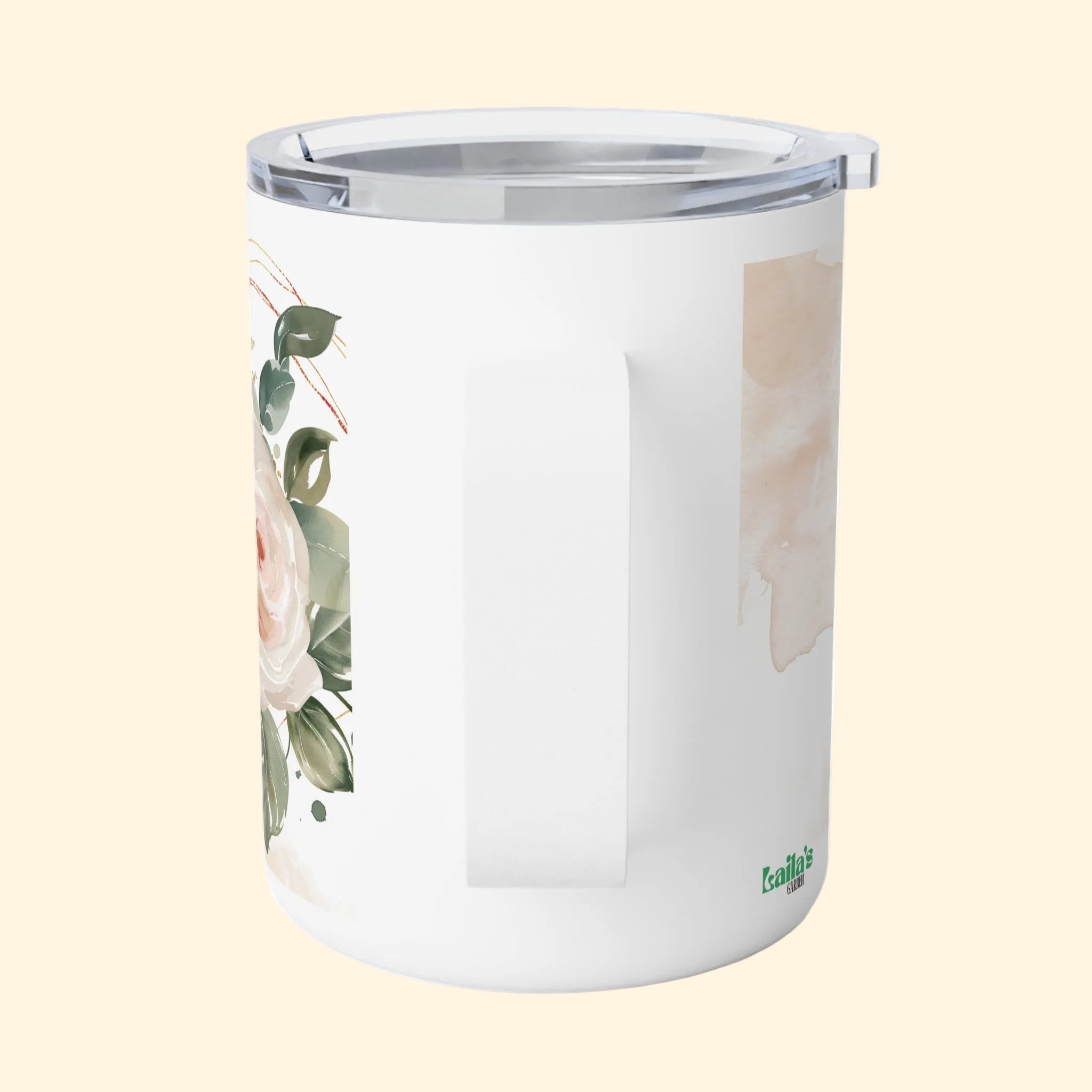 White tumbler with floral design on a white background