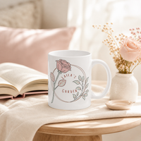 Close-up of rose wreath mug design — delicate pink blooms and green leaves from Laila's Garden
